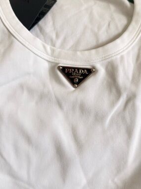Prada White Tee with Silver-Tone Triangle Plaque